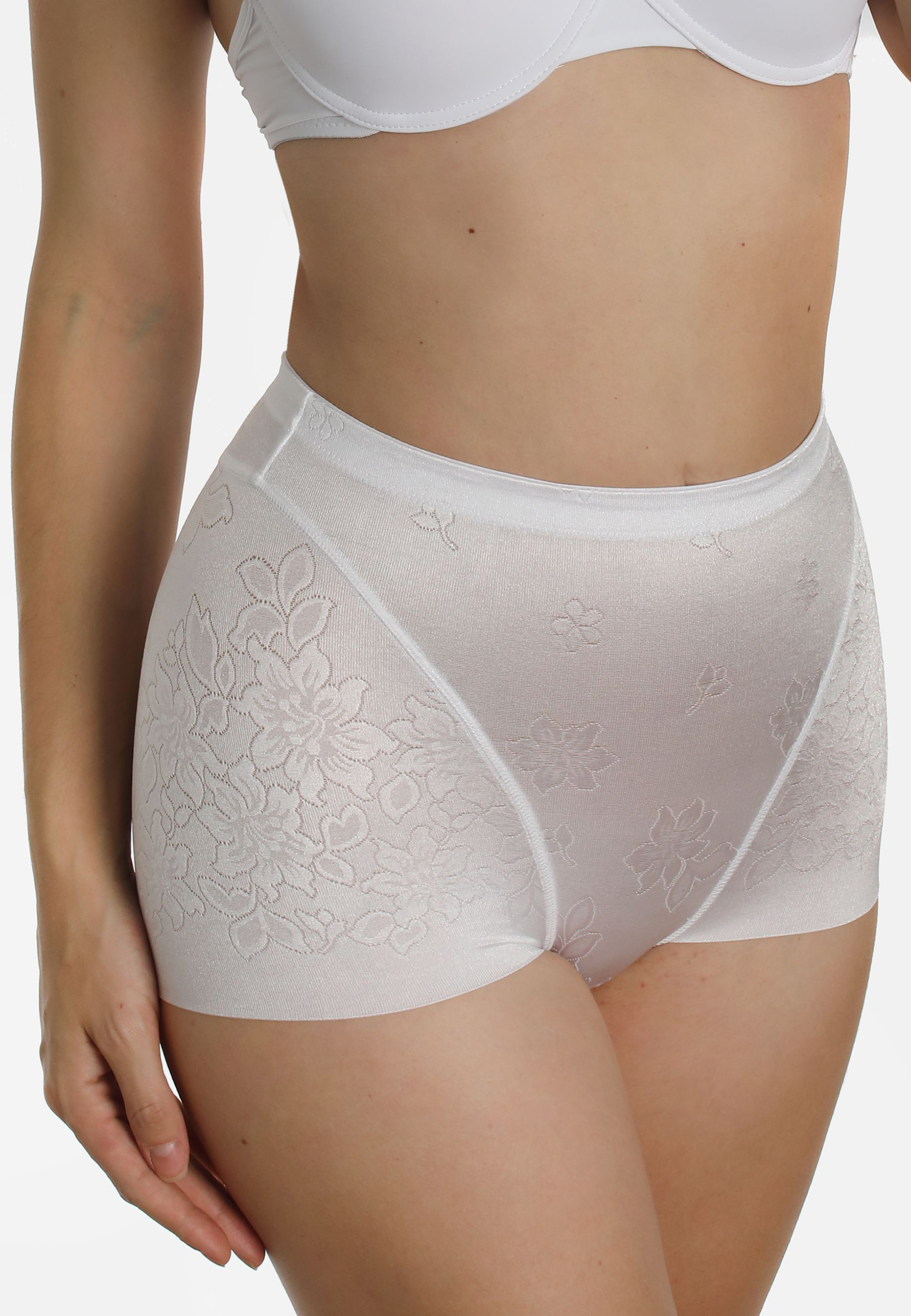Miederhose aus Blumen-Jacquard. Beinausschnitt offenkantig damit sich nichts unter der Kleidungabzeichnet.  Formend, jedoch nicht einengend.MiederhoseGlanzmaterial mit dekorativem Blumen-JacquardBeinausschnitt mit glatter Kante ohne Saum. Zeichnet sich ni