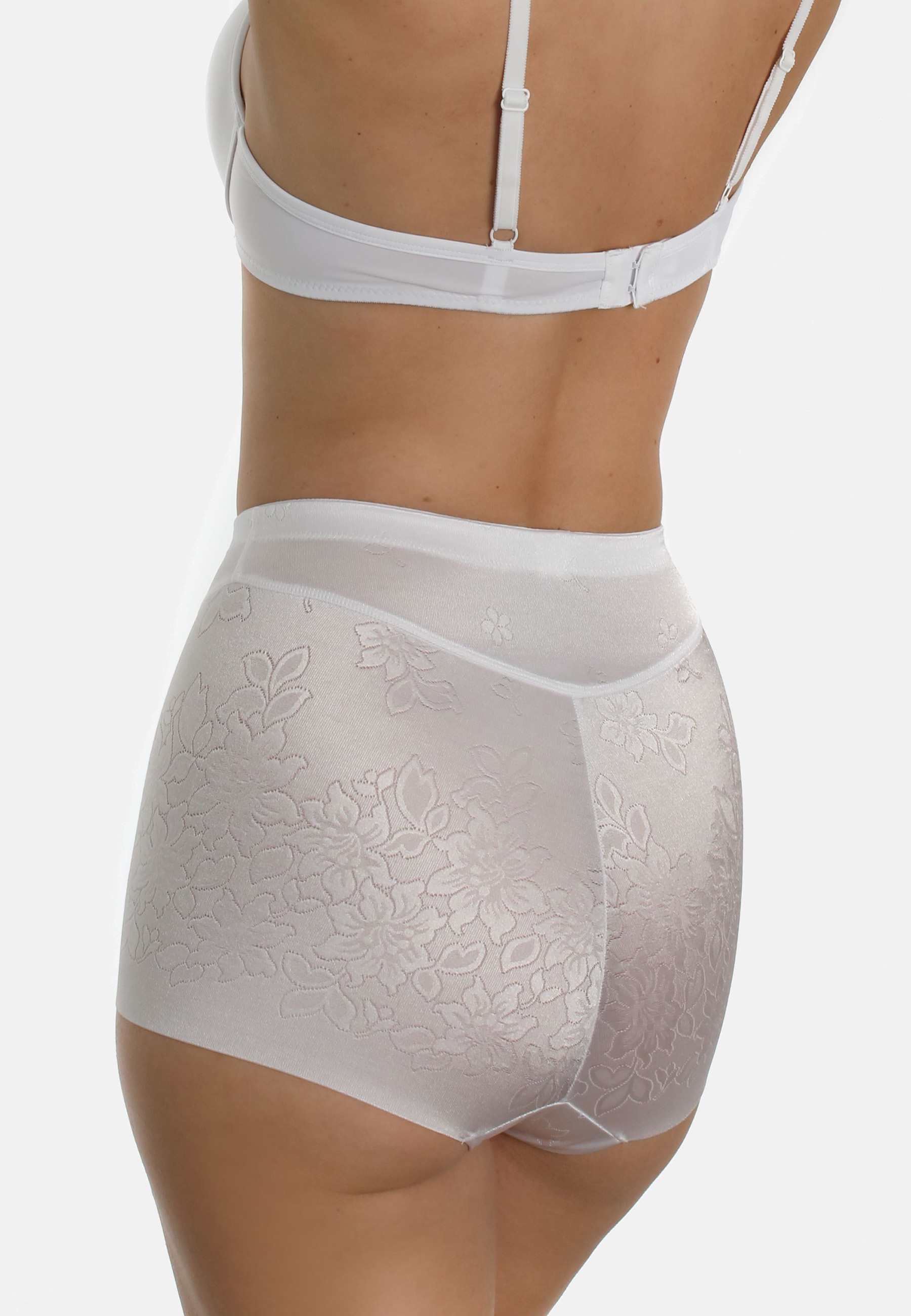 Miederhose aus Blumen-Jacquard. Beinausschnitt offenkantig damit sich nichts unter der Kleidungabzeichnet.  Formend, jedoch nicht einengend.MiederhoseGlanzmaterial mit dekorativem Blumen-JacquardBeinausschnitt mit glatter Kante ohne Saum. Zeichnet sich ni